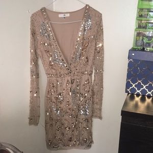 Long sleeve embellished wrap mini dress
